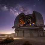 The Vera C. Rubin Observatory under a starry night sky in Chile.